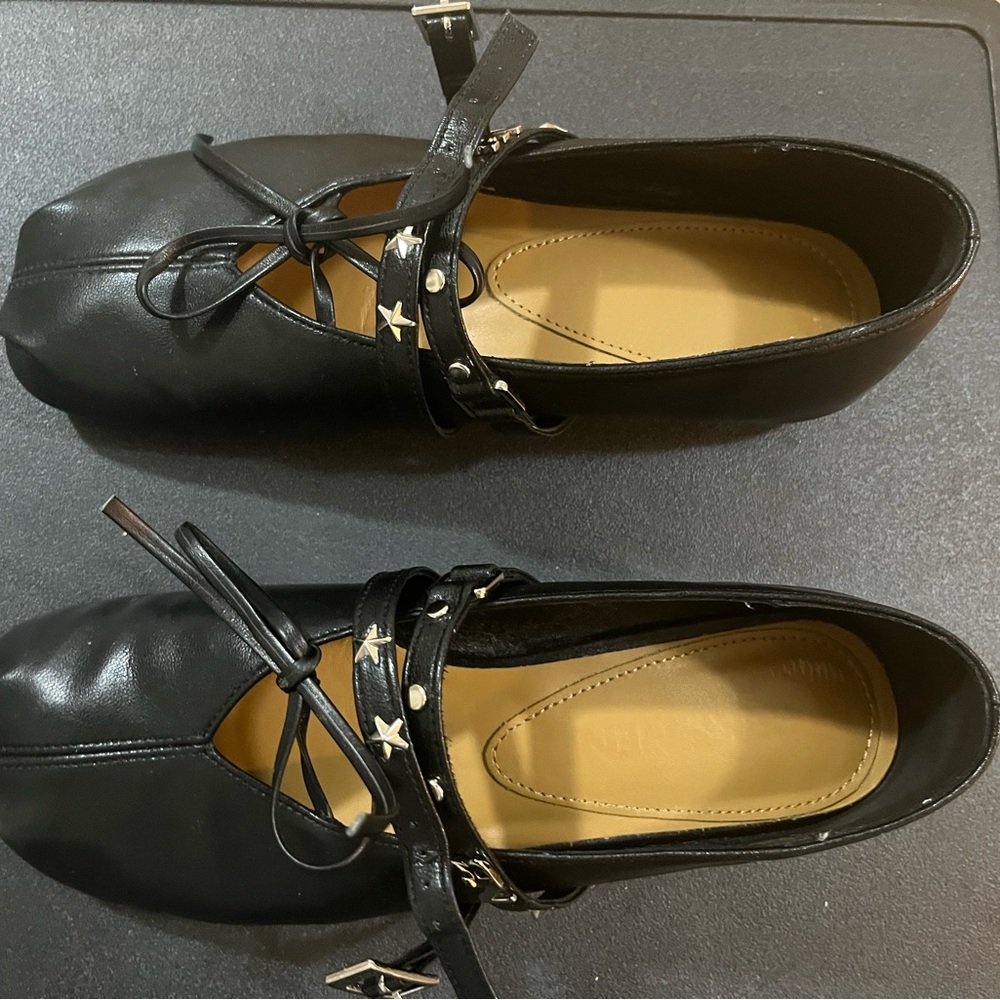 Chic Black Flats with Star Details from Reike Nen